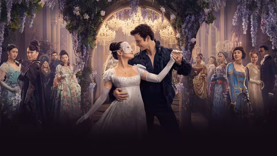 A masked woman in white dances closely with a man amid guests in a grand hall