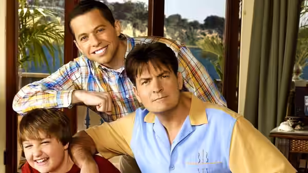 Alan Harper, Charlie Harper and Jake Harper posing together indoors by a window