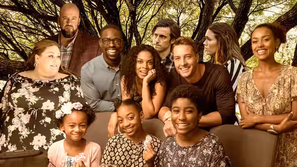 Extended Pearson family gathers together outdoors among the trees