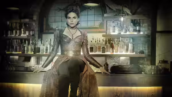 Regina Mills (Lana Parrilla) leaning on a wooden bar in a tavern