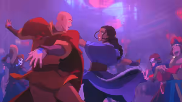 Bald man in red and woman in blue dance in a lantern-lit hall