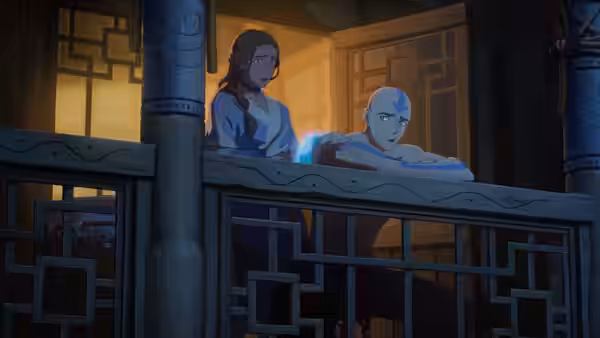 Woman and bald man lean on a balcony railing under warm light