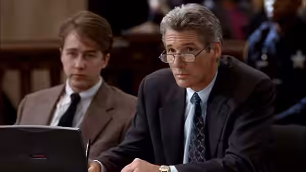 Martin Vail (Richard Gere) and Aaron Stampler (Edward Norton) seated at counsel table