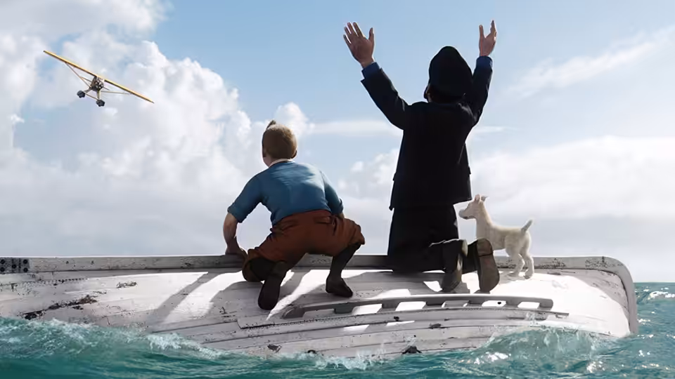 Tintin (Jamie Bell) and Captain Haddock (Andy Serkis) wave from a vessel as an airplane passes overhead