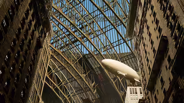 A white airship floats beneath a vast glass ceiling between city buildings