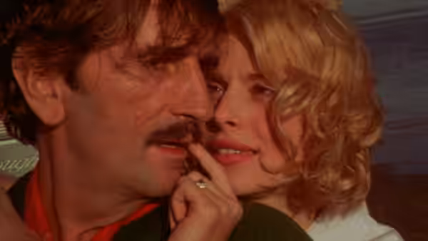 Travis (Harry Dean Stanton) and Jane (Nastassja Kinski) face to face in close-up
