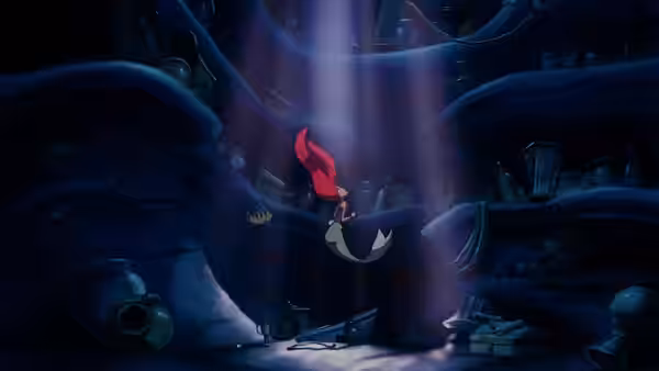 Ariel swimming through a sunlit underwater shipwreck cavern