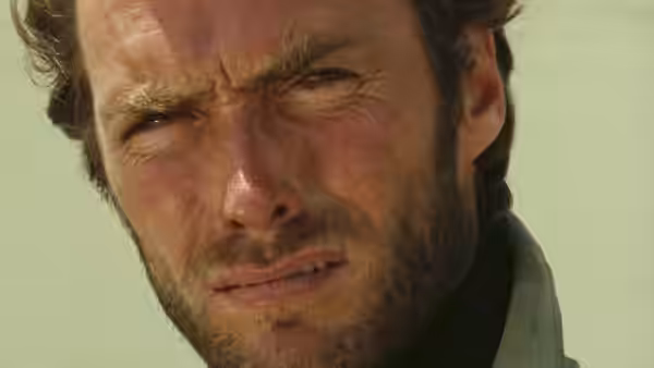 Sentenza (Lee Van Cleef) glares with a sweaty and intense face