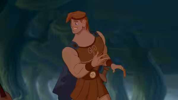 Hercules (Tate Donovan) smiling with his hand on his chest in a cave