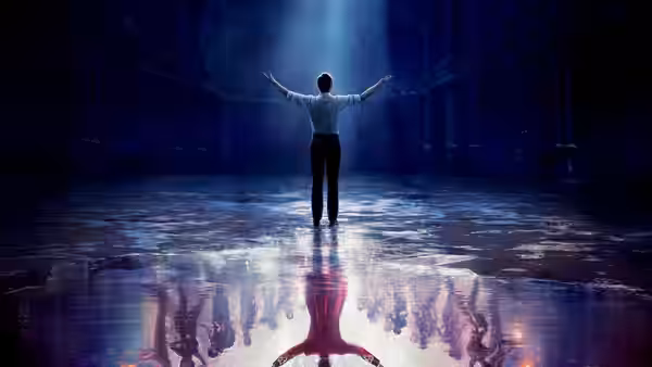 P.T. Barnum stands with arms outstretched in a vast empty hall