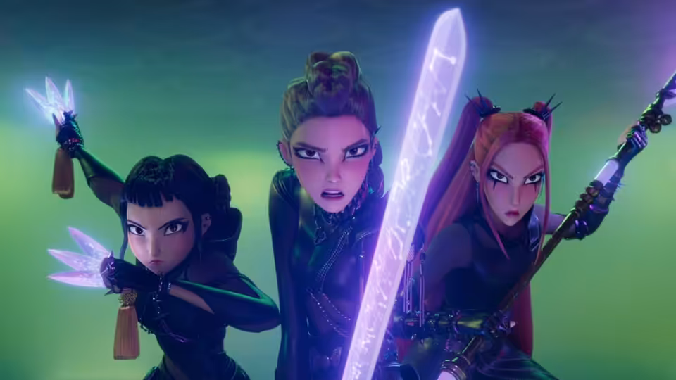 Three women stand ready with glowing weapons in a green haze
