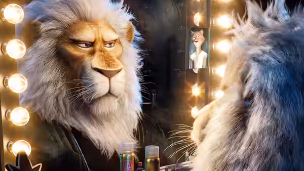 Lion looking into a mirror surrounded by round light bulbs