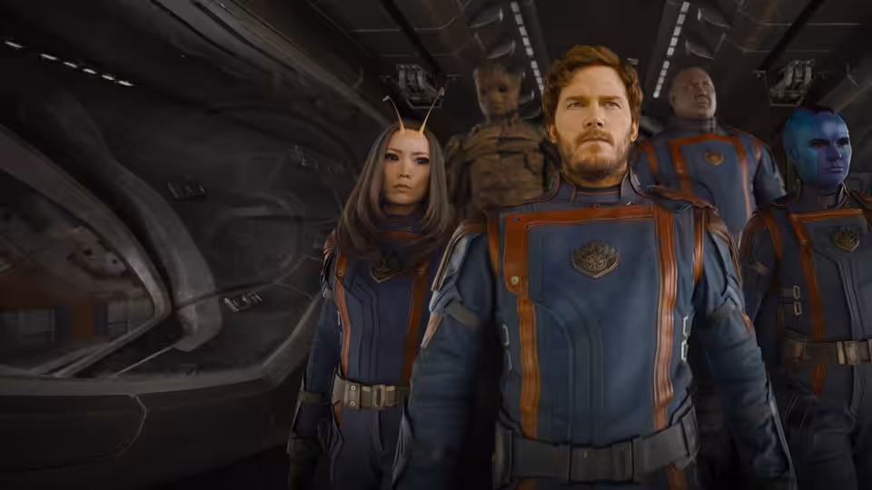 Peter Quill (Chris Pratt) and Mantis (Pom Klementieff) leading the team through a spaceship corridor