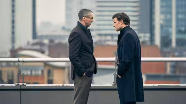 Ben Emmerson (Ralph Fiennes) and Martin Bright (Matt Smith) on a rooftop