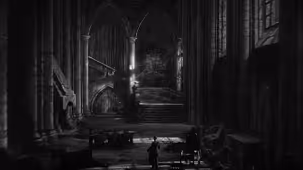 A lone figure stands in a vast vaulted hall