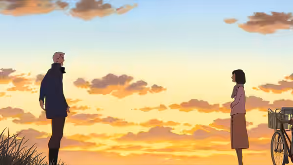 A man and a woman standing apart at sunset with a bicycle nearby