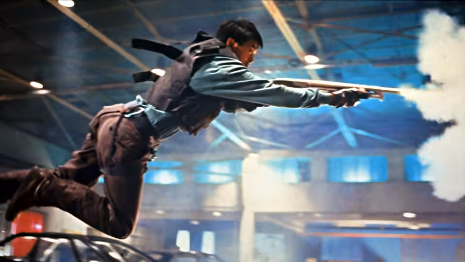 Chow Yun-Fat as Tequila leaping through the air while firing two pistols