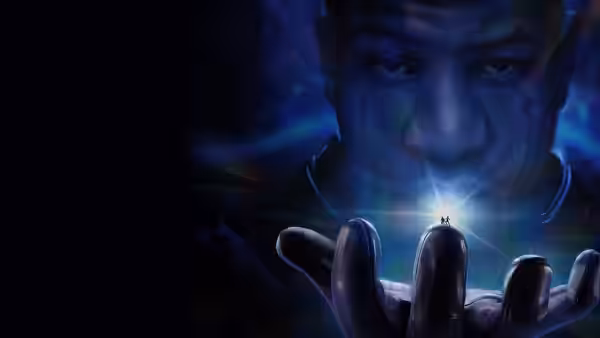 Kang the Conqueror holding a tiny glowing figure on his fingertip