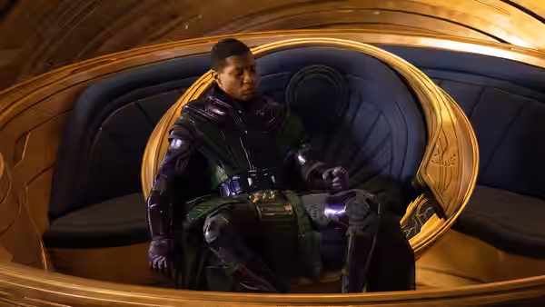 Kang the Conqueror seated in a large ornate futuristic chair