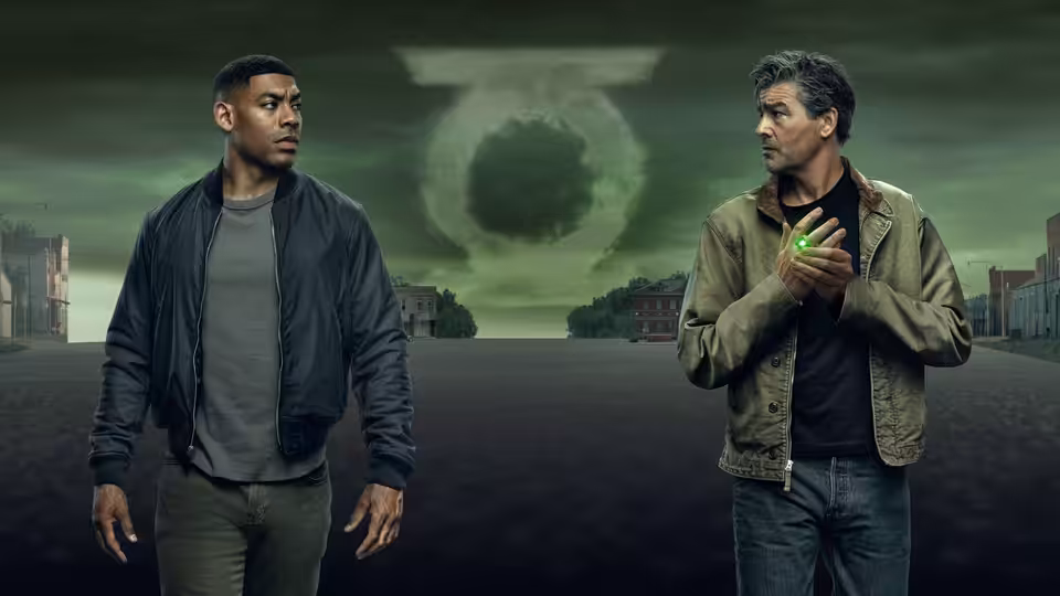 John Stewart (Aaron Pierre) and Hal Jordan (Kyle Chandler) stand before a swirling green vortex