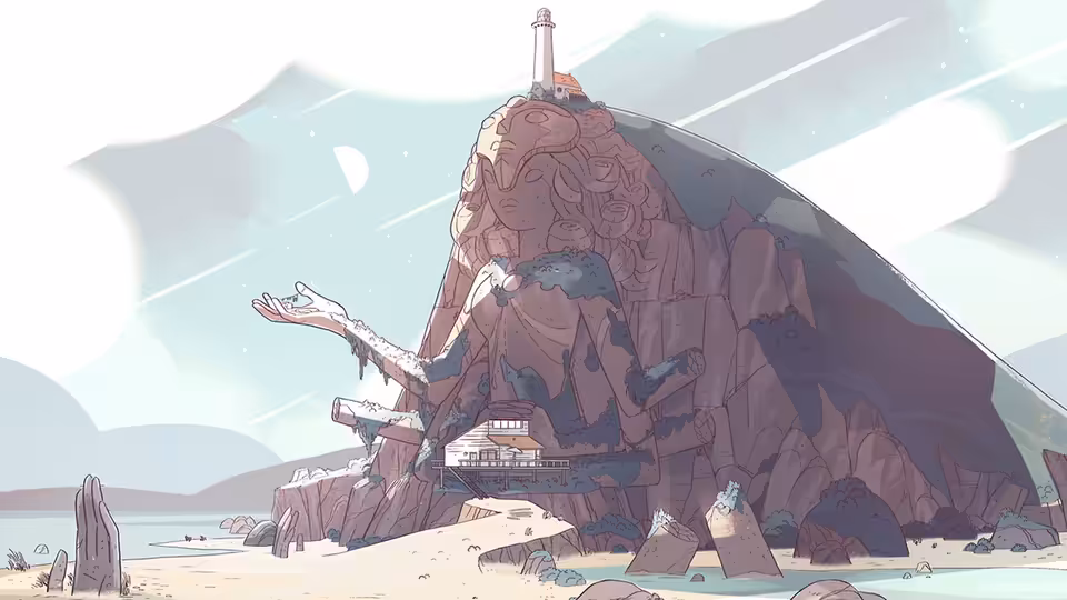 A temple-like structure built into a large rock formation by the shore