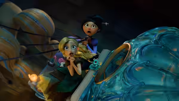 Cinderella (Amanda Seyfried) and Lilith (Ali Wong) ride in a suspended vehicle with a small green creature