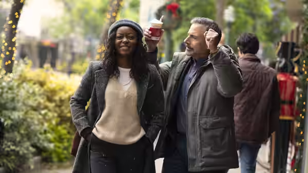 Danielle Deadwyler as Dylan Shepard outdoors with a man holding a drink