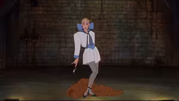 a blonde woman in a white outfit standing in a brick-walled room