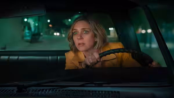 Carol Sturka (Rhea Seehorn) gripping the wheel while driving at night