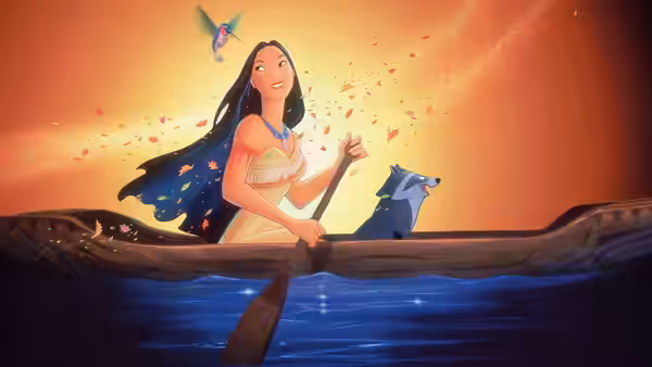 Pocahontas paddling a canoe with Meeko beside her on the water at sunset