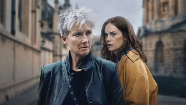 Emma Thompson as Zoë Boehm and Ruth Wilson as Sarah Trafford walking on a city street