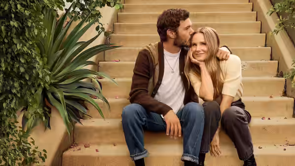 Joanne (Kristen Bell) and Noah (Adam Brody) embrace on stone steps