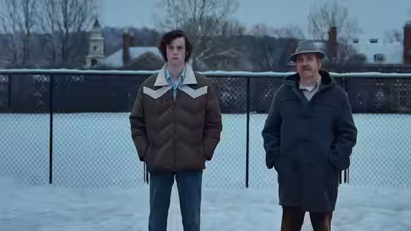 Angus Tully and Paul Hunham standing in a snowy courtyard
