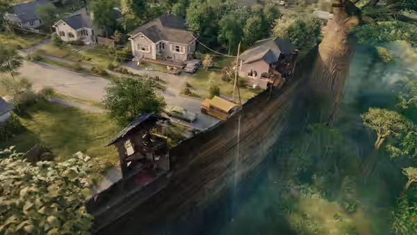 Overhead perspective of neighborhood homes beside a deep misty chasm