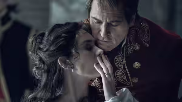 Napoleon Bonaparte (Joaquin Phoenix) embracing Josephine Bonaparte (Vanessa Kirby)