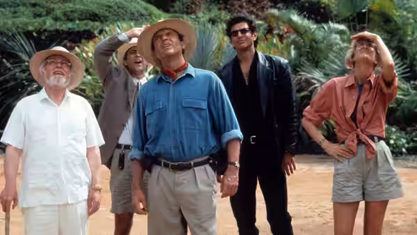Grant (Sam Neill), Ellie (Laura Dern), Malcolm (Jeff Goldblum) and others gazing upward