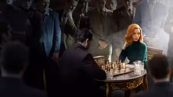 Beth Harmon (Anya Taylor-Joy) facing an opponent across a chessboard in smoke
