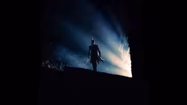 Silhouetted warrior holds two swords in a cave opening lit by daylight
