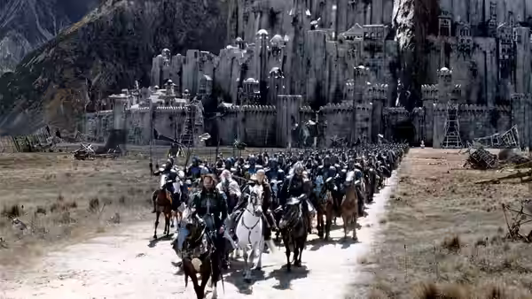 Riders approaching the gates of a dark mountain stronghold