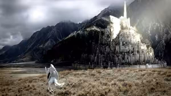 Gandalf (Ian McKellen) on a white horse approaching Minas Tirith
