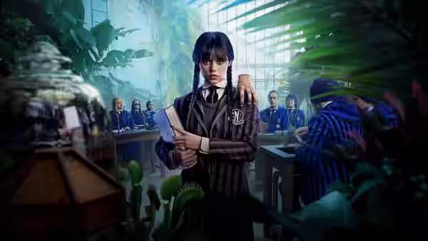 Wednesday (Jenna Ortega) holding a book in a sunlit academy classroom