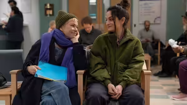 Molly Kochan (Michelle Williams) and Nikki Boyer (Jenny Slate) in waiting room