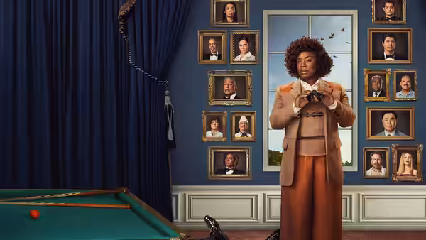 Cordelia Cupp (Uzo Aduba) holds binoculars in a room with a pool table