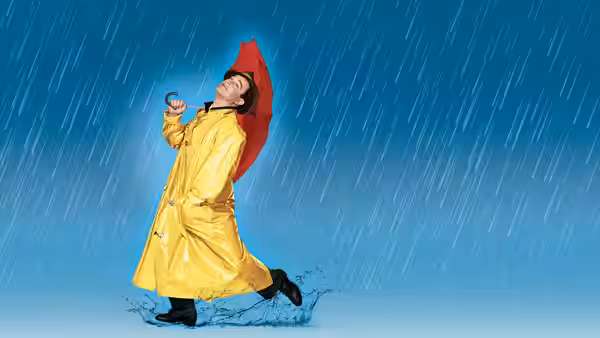 Don Lockwood (Gene Kelly) dancing with an umbrella in the rain