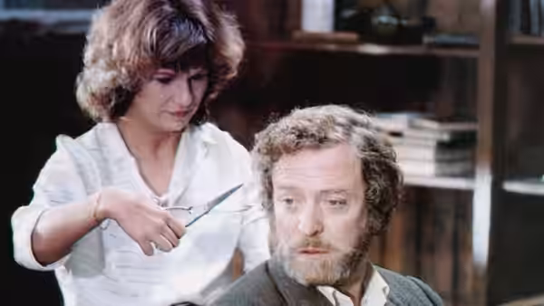 Rita (Julie Walters) cutting Frank's (Michael Caine) hair in a study