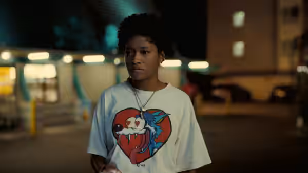 Emerald Haywood (Keke Palmer) stands outside at night in a graphic T-shirt