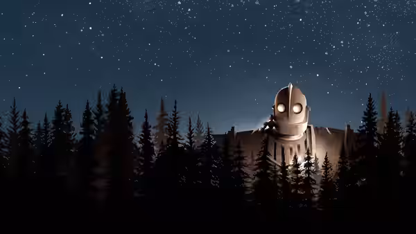 The Iron Giant standing behind trees under a starry night sky