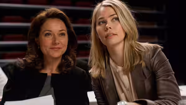 Birgitte Nyborg (Sidse Babett Knudsen) and Katrine Fønsmark sit together
