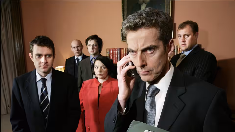 Malcolm Tucker (Peter Capaldi) on phone call with colleagues in office