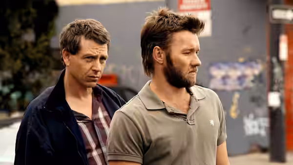 Nathan Leckie (Guy Pearce) and Baz (Joel Edgerton) on a city street
